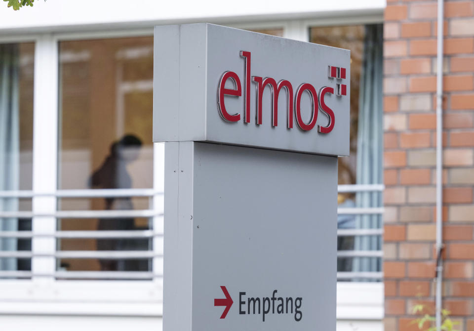 The company logo is seen at the entrance of the Elmos Semiconductor SE company in Dortmund, Germany, on Wednesday, Nov. 9, 2022. The German government on Wednesday blocked the sale of a chip factory to a Swedish subsidiary of a Chinese company, a decision that comes as Berlin grapples with its future approach to Beijing. (Bernd Thissen/dpa via AP)