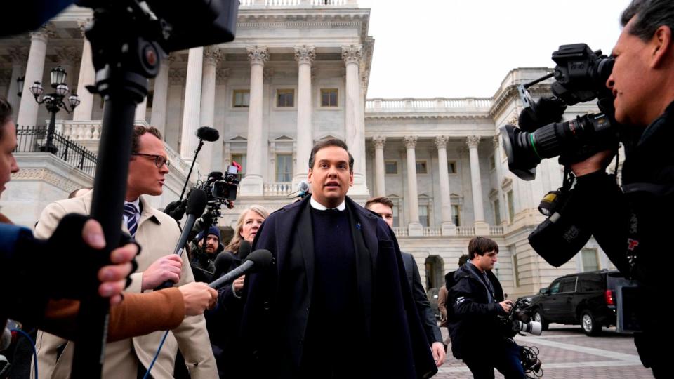 PHOTO: Rep. George Santos  is surrounded by journalists as he leaves the U.S. Capitol after his fellow members of Congress voted to expel him from the House of Representatives on Dec. 1, 2023 in Washington, DC.  (Drew Angerer/Getty Images)