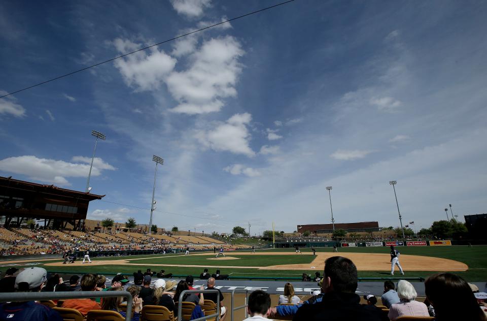 Fans at Camelback Ranch watch a Chicago White Sox spring training baseball game at Camelback Ranch.