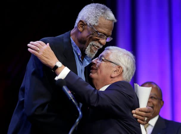 PHOTO: In this Wednesday, Oct. 2, 2013 file photo, Former Boston Celtics basketball player Bill Russell, left, hugs NBA Commissioner David Stern during an award ceremony for the W.E.B. Du Bois Medal at Harvard University, in Cambridge, Mass. (Steven Senne/AP, FILE)