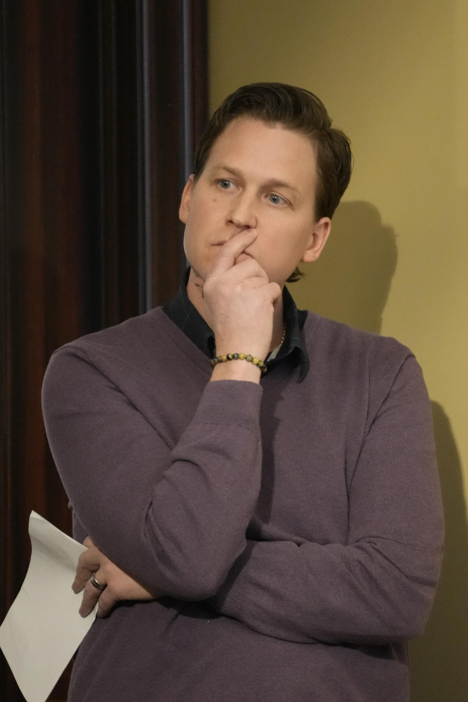 Shawn Blymiller, looks on during a news conference on Wednesday, Feb. 15, 2023, in Salt Lake City. Blymiller, a 39-year-old father of two from suburban Salt Lake City, said he started magic mushroom therapy for treatment-resistant depression after becoming disillusioned with traditional anti-depressants. Lawmakers throughout the United States are weighing proposals to legalize psychedelic mushrooms for people. (AP Photo/Rick Bowmer)