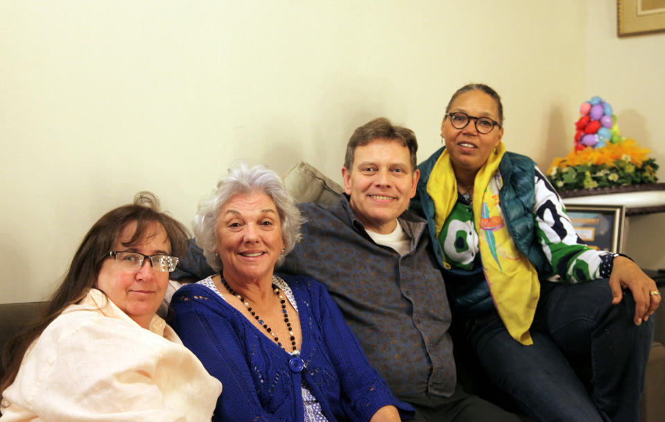 This April 24, 2014 photo shows, from left, hair and makeup artist Geordie Sheffer, actress Tyne Daly, personal assistant John V. Fahey and dresser Valerie Gladstone in the dressing room at the Golden Theatre in New York. Daly is reuniting with her team from "Gypsy" on Broadway for the current run of "Mothers and Sons." (AP Photo/Mark Kennedy)