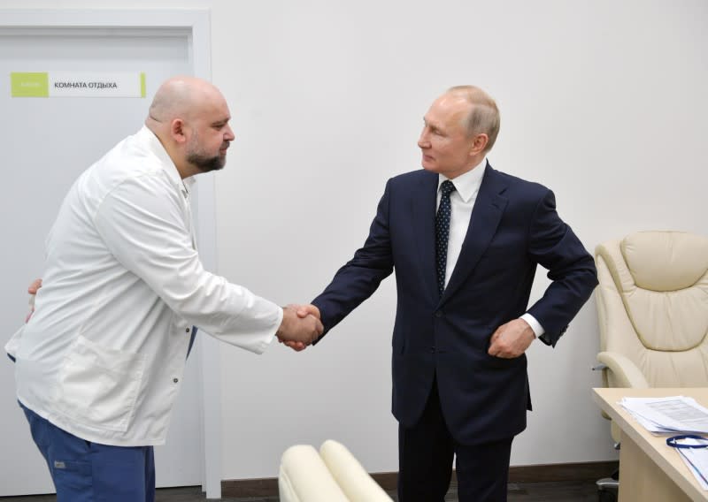 Russian President Putin visits a hospital for patients infected with coronavirus disease (COVID-19) on the outskirts of Moscow