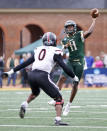 William & Mary quarterback Darius Wilson throws a pass over Gardner-Webb's linebacker Tray Dunson during the first half of an FCS playoffs NCAA college football game at The College of William and Mary in Williamsburg, Va. on Saturday, Dec. 3, 2022. (Daniel Sangjib Min/Richmond Times-Dispatch via AP)