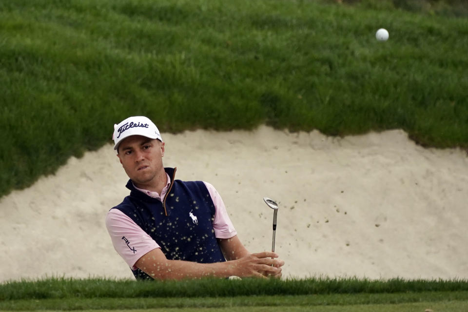 Justin Thomas hits from bunker to the second green during the third round of the Zozo Championship golf tournament Saturday, Oct. 24, 2020, in Thousand Oaks, Calif. (AP Photo/Marcio Jose Sanchez)