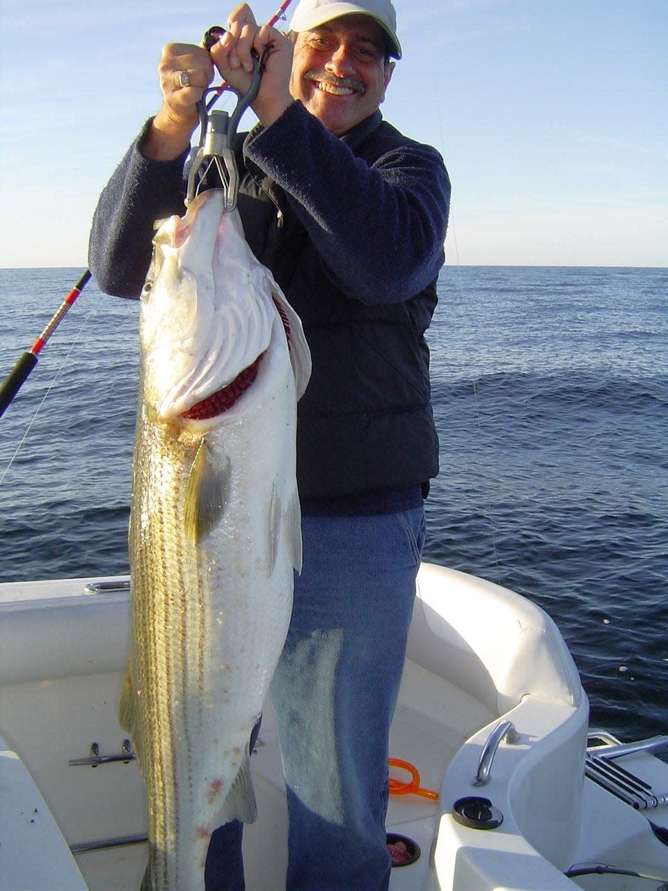 Make sure your gear is ready for that big fish, like this 45-pound striped bass that Capt. Dave Monti is holding.