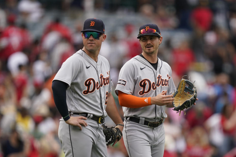 Detroit Tigers first baseman Spencer Torkelson, left, and right fielder Zach McKinstry stand after winning a baseball game, 5-3, against the Los Angeles Angels, Sunday, Sept. 17, 2023, in Anaheim, Calif. (AP Photo/Ryan Sun)