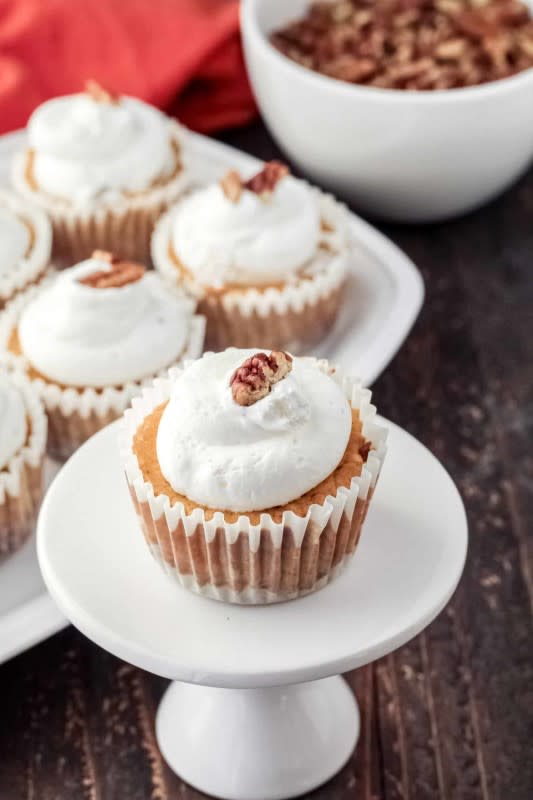 <p>Mile High Mitts</p><p>Skinny mini pumpkin cheesecakes filled with pumpkin puree and pumpkin spice, complete with a crust made of chopped pecans and maple syrup.</p><p><strong>Get the recipe: <a href="https://www.milehighmitts.com/skinny-mini-pumpkin-cheesecakes/" rel="nofollow noopener" target="_blank" data-ylk="slk:Skinny Mini Pumpkin Cheesecakes;elm:context_link;itc:0;sec:content-canvas" class="link rapid-noclick-resp">Skinny Mini Pumpkin Cheesecakes</a></strong></p>