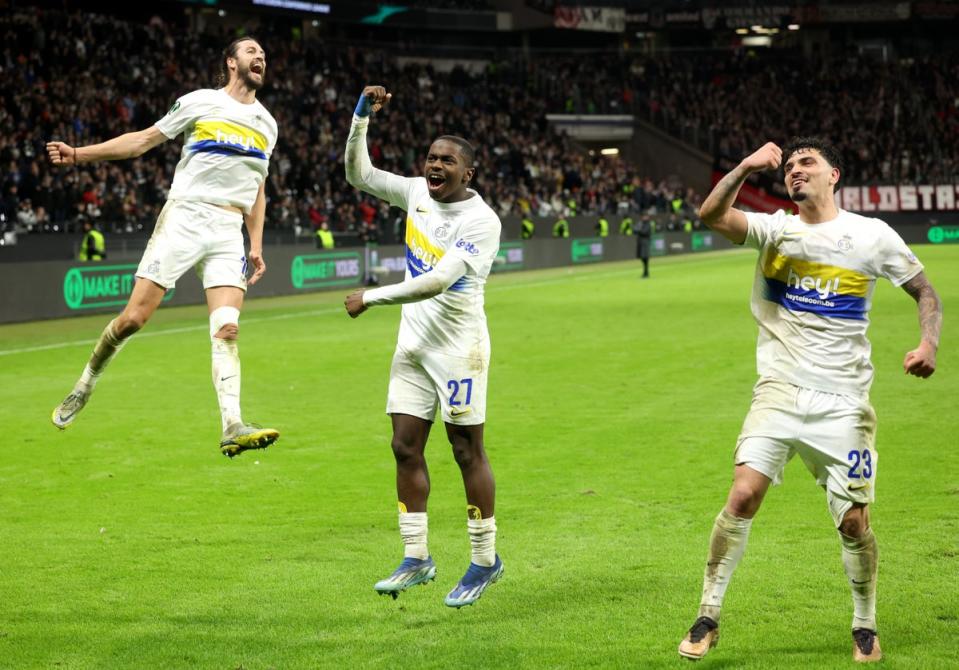 Christian Burgess, Noah Sadiki and Cameron Puertas of Union Saint-Gilloise celebrate victory in the Uefa Europa Conference League playoffs  (Getty Images)