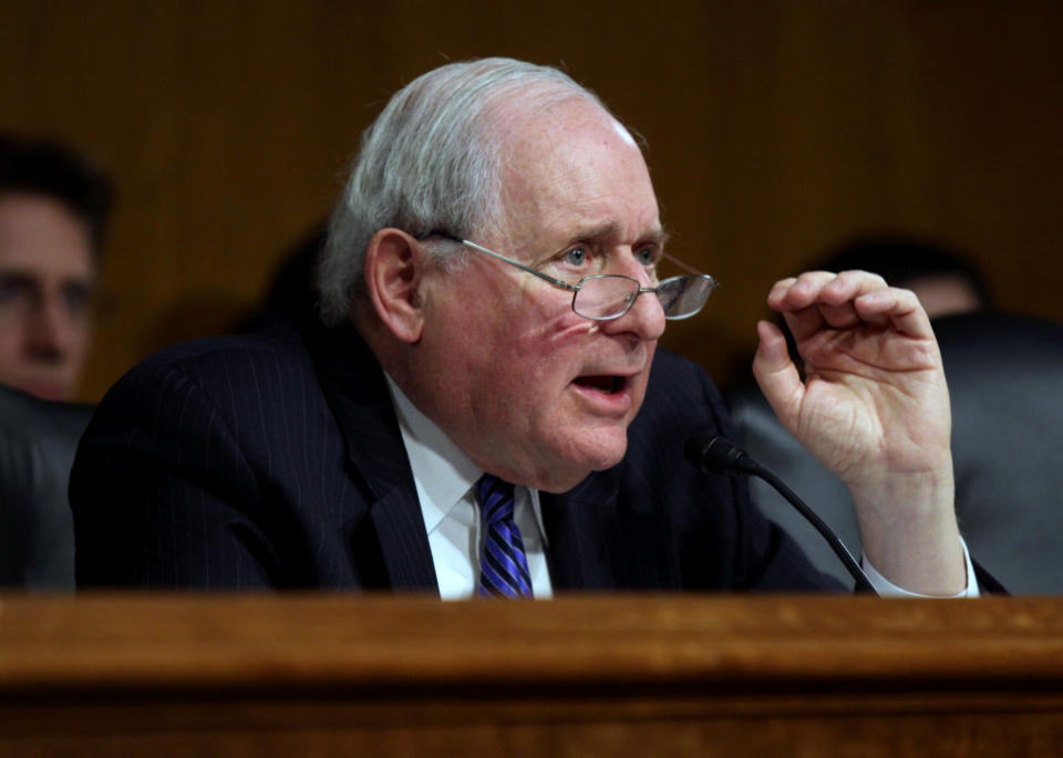 Senate Permanent subcommittee on Investigations Chairman Sen. Carl Levin, D-Mich., speaks on Capitol Hill in Washington, Tuesday, April 1, 2014, during the subcommittee's hearing: "Caterpillar's Offshore Tax Strategy. Calling Caterpillar Inc., a member of the "corporate profit-shifting club," Levin accused the manufacturing giant Tuesday of employing an aggressive tax strategy to avoid paying billions of dollars in U.S. taxes. (AP Photo/Lauren Victoria Burke)