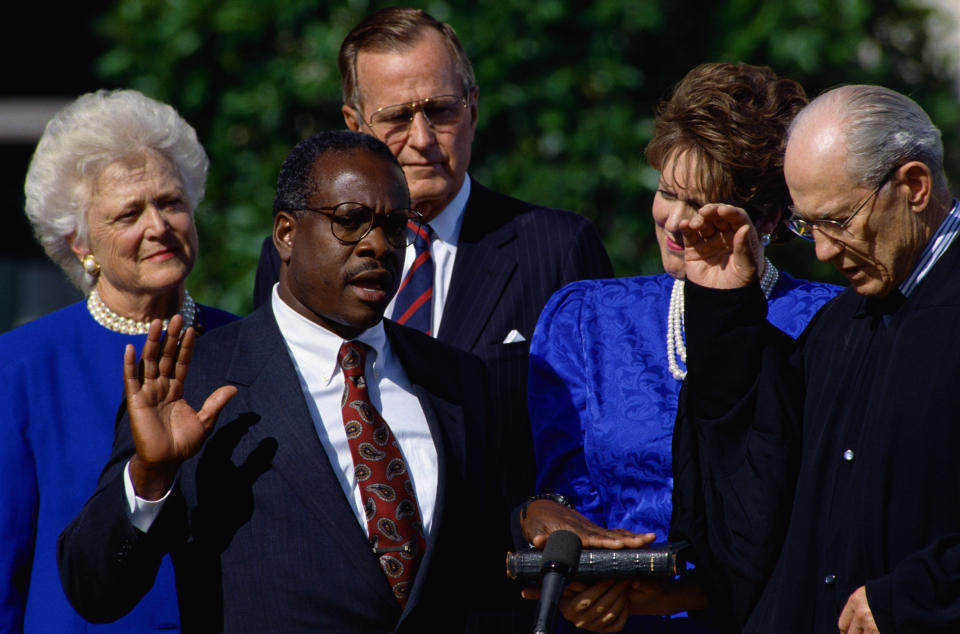 Clarence Thomas is sworn in as an associate justice of the U.S. Supreme Court at the White House on October 18, 1991. / Credit: Wally McNamee/CORBIS/Corbis via Getty Images