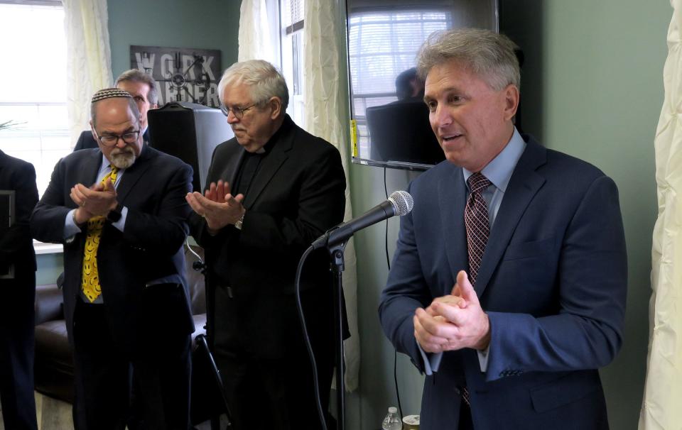 Oceanport Mayor John F. "Jay" Coffey speaks after the ribbon-cutting for the new Family Promise emergency shelter on the old Fort Monmouth property in Oceanport Friday, April 5, 2019. 