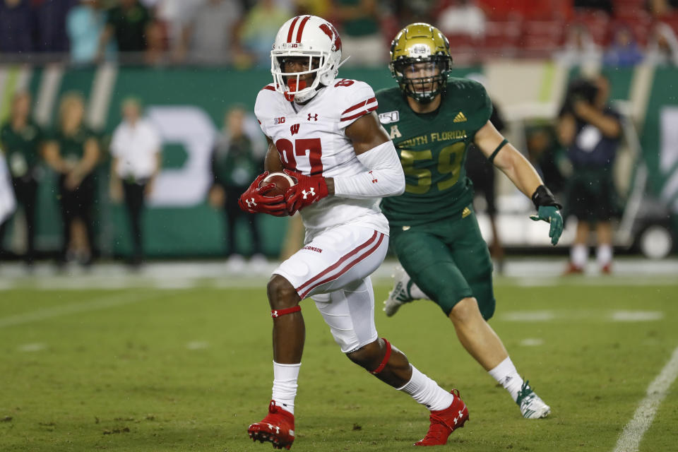 Wisconsin Badgers wide receiver Quintez Cephus (87) catches a pass during an NCAA football game on Friday, Aug. 30, 2019 in Tampa, Fla. (AP Photo/Mark Lomoglio)