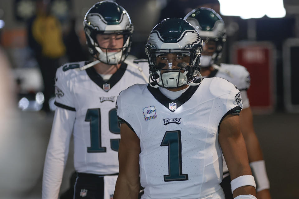Philadelphia Eagles quarterback Jalen Hurts (1) prepares to walk on the field before an NFL football game against the New York Jets, Sunday, Oct. 15, 2023, in East Rutherford, N.J. (AP Photo/Adam Hunger)