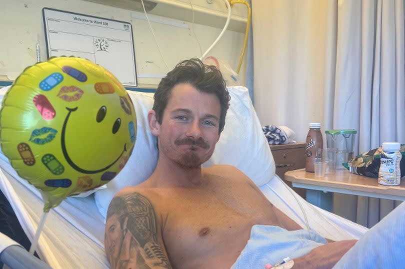 Mark Baxter in hospital where he underwent surgery