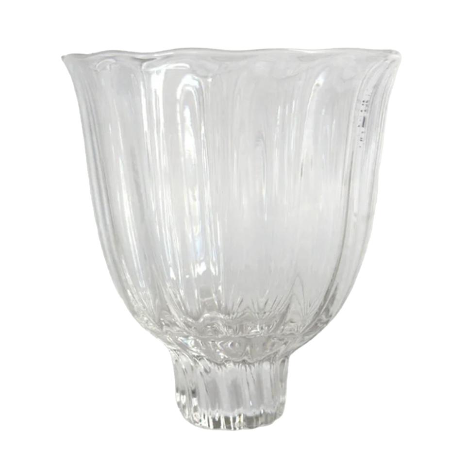 <p><a href="https://eye-swoon.com/products/halcyon-still-glass-athena-calderone" rel="nofollow noopener" target="_blank" data-ylk="slk:Shop Now;elm:context_link;itc:0;sec:content-canvas" class="link ">Shop Now</a></p><p>Still Glasses</p><p>eye-swoon.com</p><p>$70.00</p>