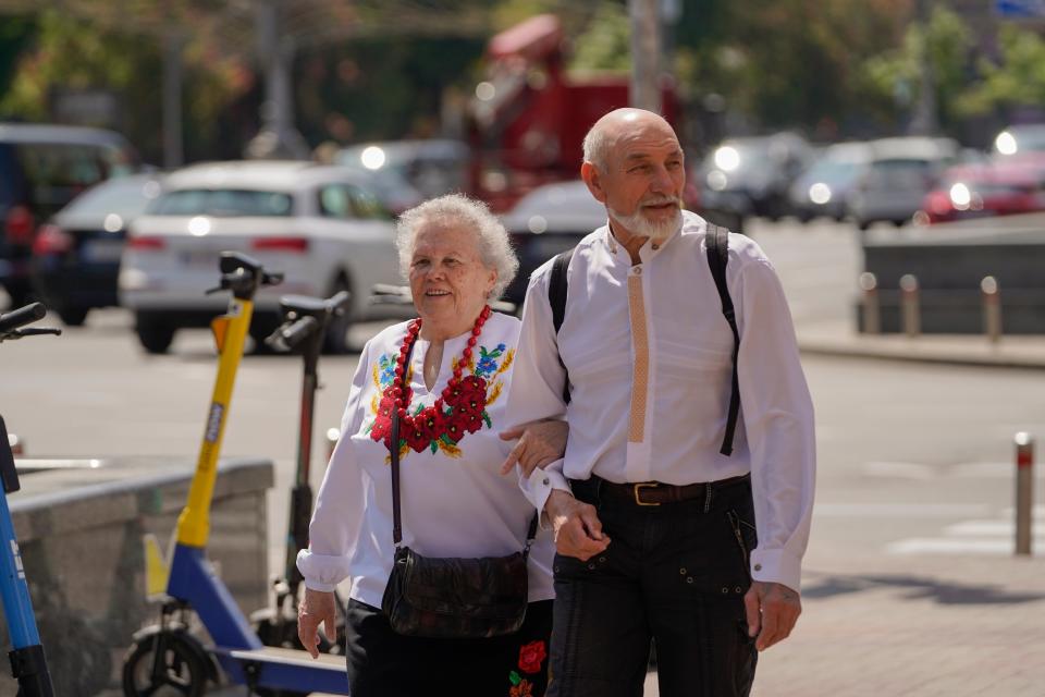 A couple of elderly people wearing vyshyvankas on Vyshyvanka Day walk the Khreshchatyk Street in Kyiv (Global Images Ukraine via Getty)