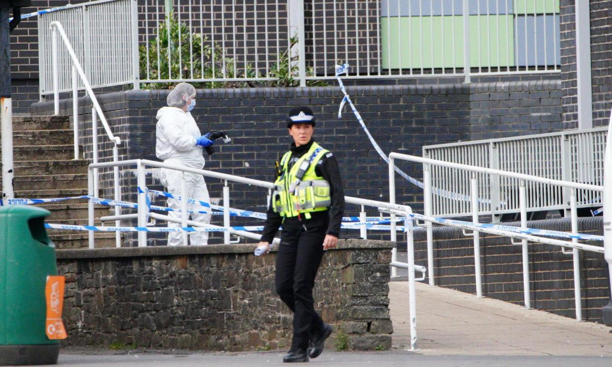<span>Police and forensics investigators at Ysgol Dyffryn Aman on Wednesday.</span><span>Photograph: Ben Birchall/PA Media</span>