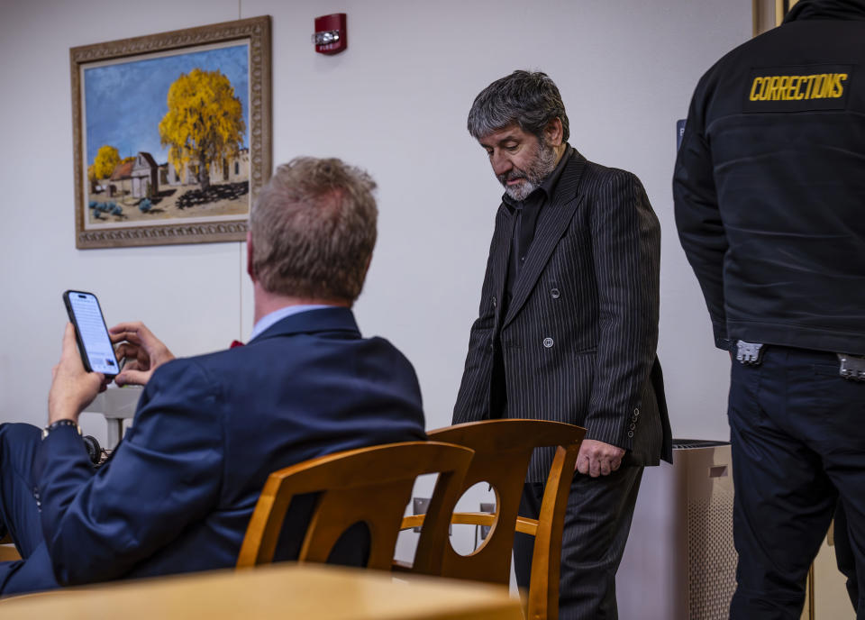 Muhammad Syed enters the court room before closing arguments at the Bernalillo County Courthouse in Downtown Albuquerque, N.M,, on Friday, March 15, 2024. Prosecutors on Friday wrapped up their case against Syed on charges that he gunned down a man in 2022 in what turned out to be the first of three ambush-style killings involving members of the Muslim community in New Mexico's largest city. (Chancey Bush/The Albuquerque Journal via AP, Pool)