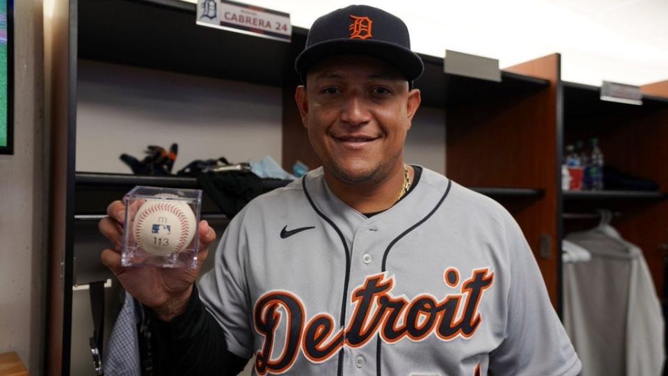 Detroit Tigers' Miguel Cabrera holds the ball he hit for his 500th career home run at Rogers Centre in Toronto, Aug. 22, 2021.