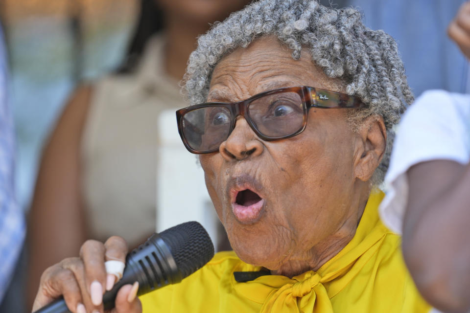 Opal Lee speaks on the porch of her new home in Fort Worth, Texas, Friday, June 14, 2024. Habitat for Humanity built Lee the home on the same lot where as a child a white mob destroyed her family's home driving them away. (AP Photo/LM Otero)