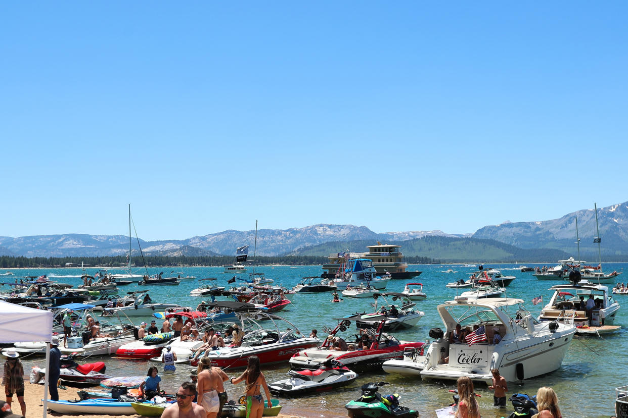 Boats sit in Lake Tahoe near hole 17 during a golf tournament on July 9, 2022.  (Isaiah Vazquez / Getty Images file)