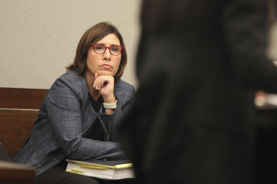 Mandi Hunter, an attorney representing a Planned Parenthood Great Plains clinic on the Kansas side of the Kansas City area, listens to arguments during a hearing about a new state law over how providers dispense abortion medications, Tuesday, Aug. 8, 2023, in Johnson County District Court in Olathe, Kan. (AP Photo/John Hanna)