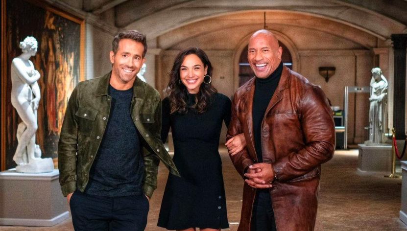 The Rock shared this photo of himself with co-stars Ryan Reynolds and Gal Gadot to celebrate wrapping on Red Notice. (Instagram/TheRock)