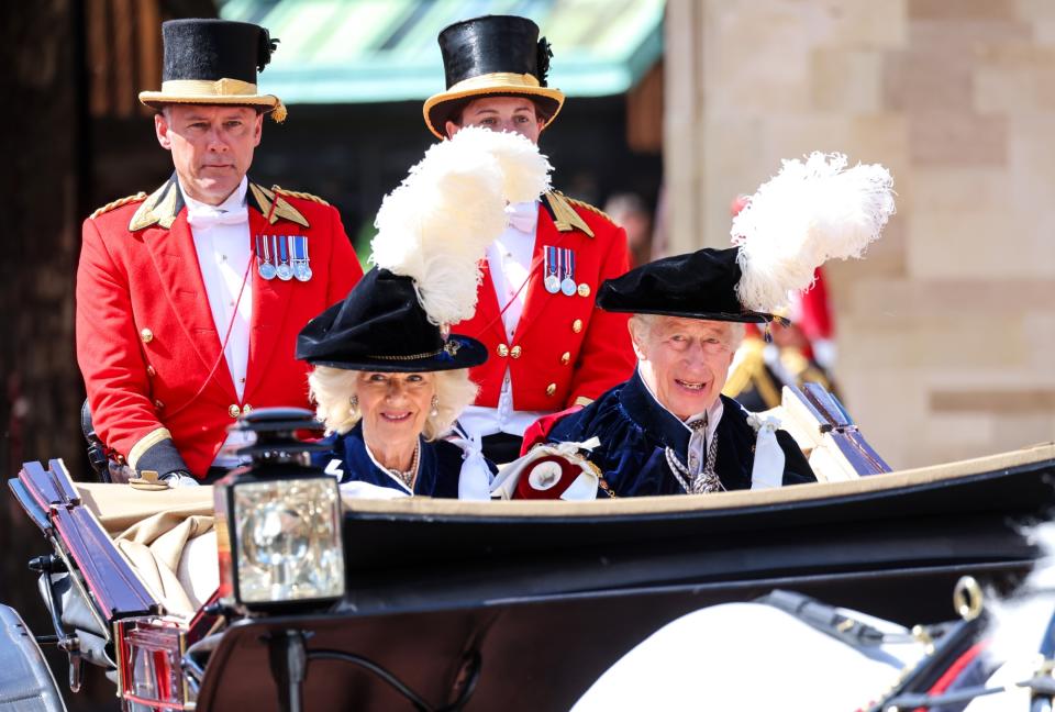  Queen Camilla and King Charles III depart the Order Of The Garter Service at Windsor Castle on June 17, 2024 in Windsor, England. The Order of the Garter, Britain's oldest chivalric order established by Edward III, includes The King, Queen, Royal Family members, and up to 24 companions honoured for their public service. Companions of the Garter are chosen personally by the Sovereign to honour those who have held public office, who have contributed in a particular way to national life or who have served the Sovereign personally. (Photo by Chris Jackson - WPA Pool/Getty Images)