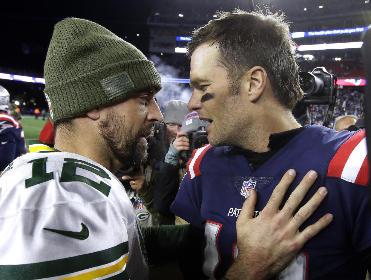 Aaron Rodgers is trying to win big after changing teams late in his career. Tom Brady knows a thing or two about that. (AP Photo/Steven Senne)