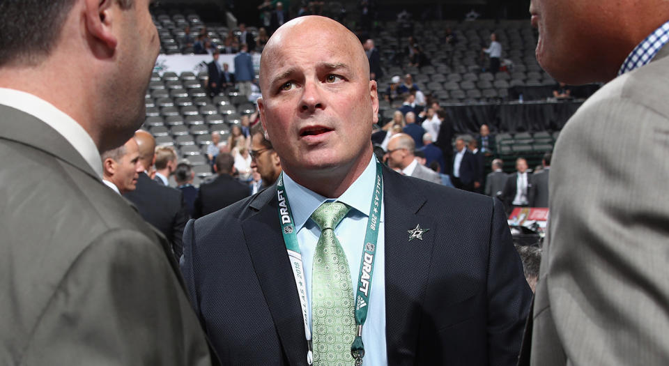 DALLAS, TX - JUNE 22: Head coach of the Dallas Stars Jim Montgomery chats prior to the first round of the 2018 NHL Draft at American Airlines Center on June 22, 2018 in Dallas, Texas. (Photo by Bruce Bennett/Getty Images) 