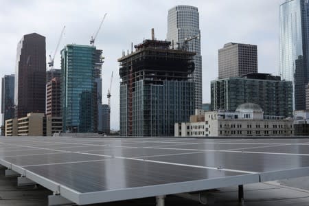 FILE PHOTO: Solar electric panels on residential bulding in down town Los Angeles