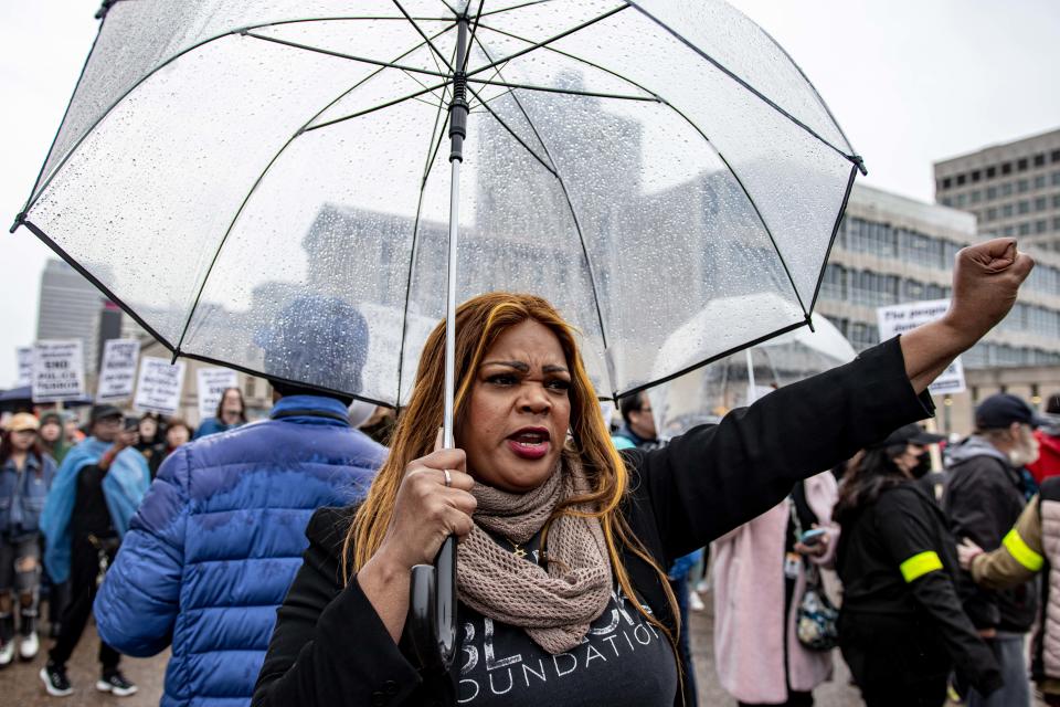 A woman protests in Memphis on Jan. 28, 2023 following the release of video showing the deadly encounter between Tyre Nichols and police.