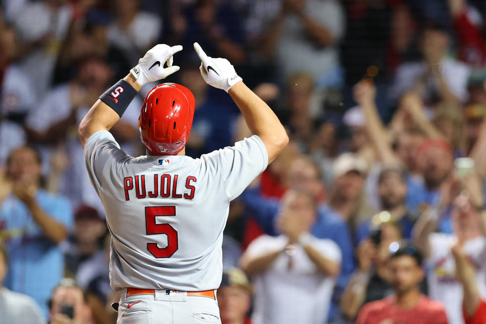 CHICAGO, ILLINOIS - AUGUST 22: Albert Pujols #5 of the St. Louis Cardinals celebrates his solo home run during the seventh inning against the Chicago Cubs at Wrigley Field on August 22, 2022 in Chicago, Illinois. (Photo by Michael Reaves/Getty Images)