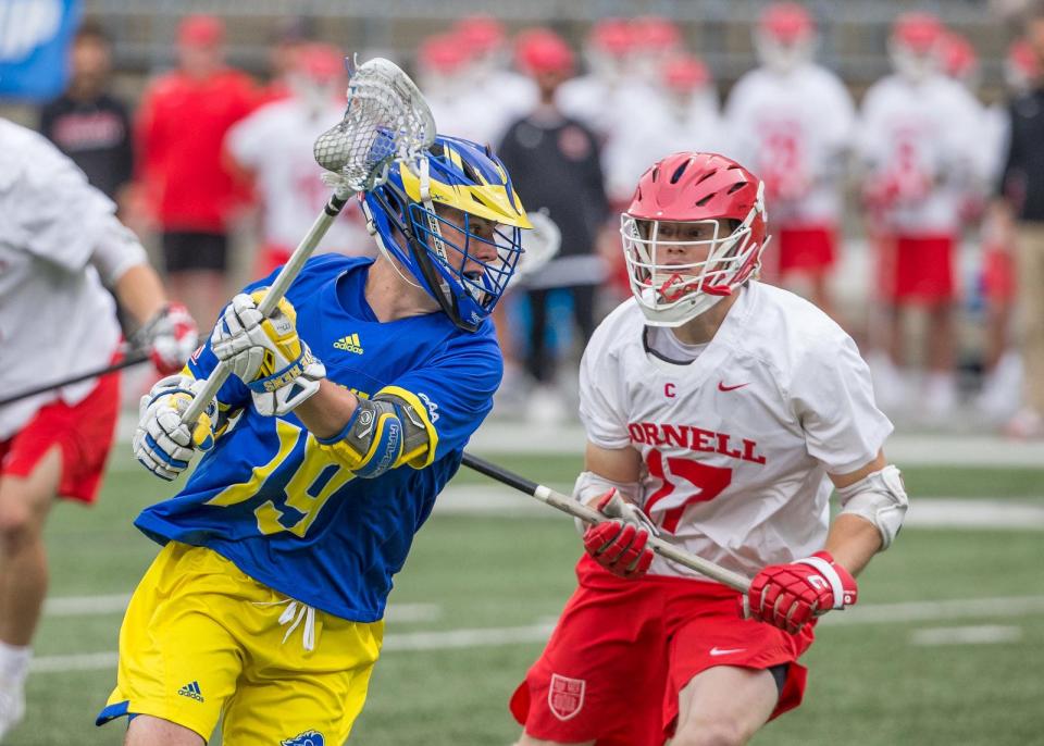 Delaware's Mike Robinson looks for room to score in Sunday's NCAA Lacrosse Tournament quarterfinal against Cornell at Ohio Stadium.