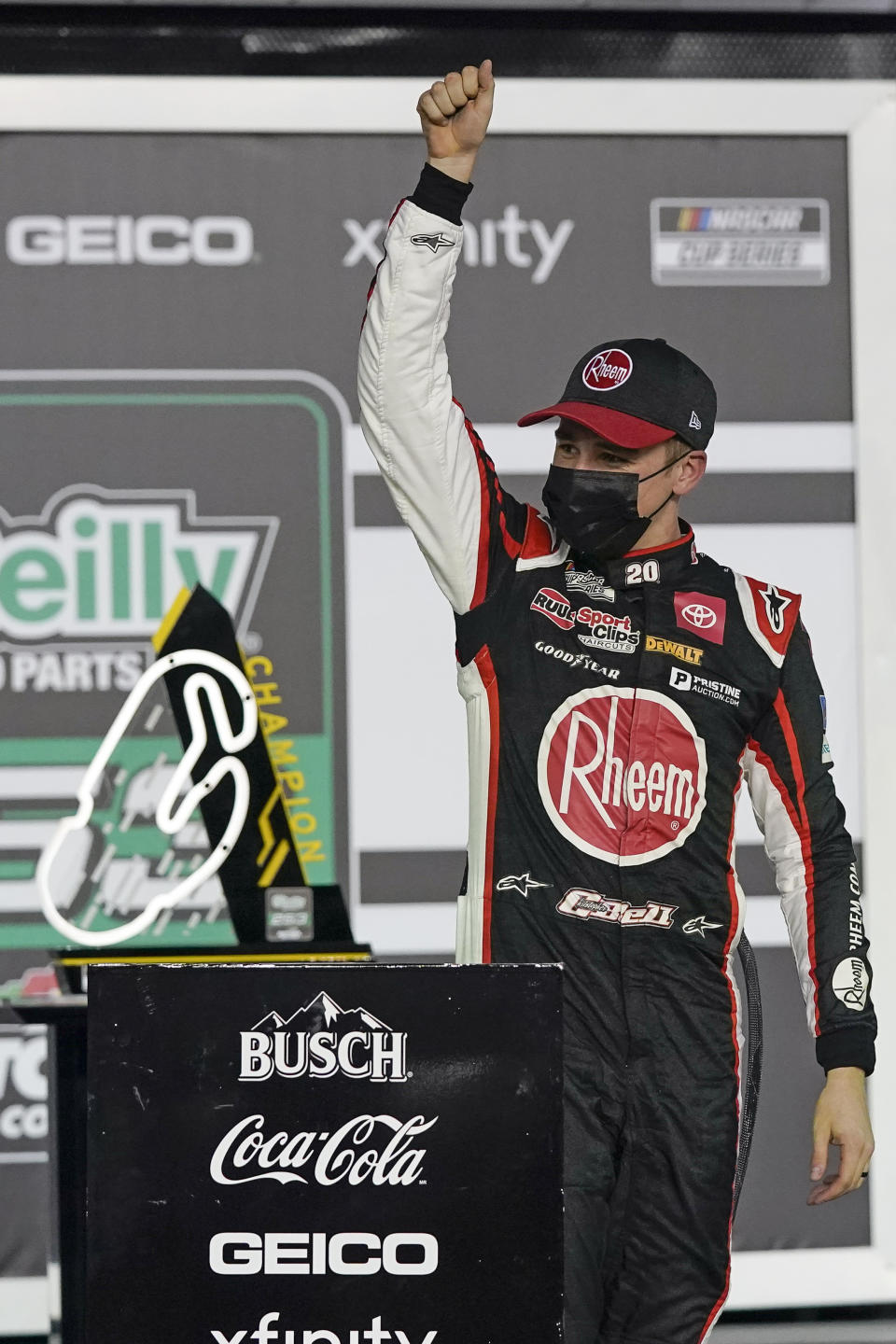 Christopher Bell celebrates in Victory Lane after winning the NASCAR Cup Series road course auto race at Daytona International Speedway, Sunday, Feb. 21, 2021, in Daytona Beach, Fla. (AP Photo/John Raoux)