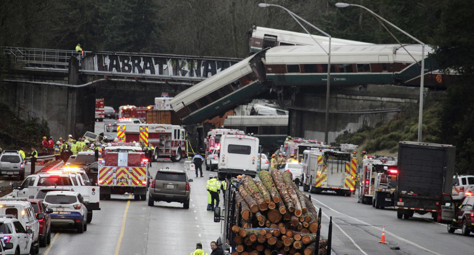 <p>A derailed train is seen on southbound Interstate 5 on Monday, Dec. 18, 2017, in DuPont, Wash. (Photo: Rachel La Corte/AP) </p>