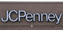 In this Wednesday, Aug. 14, 2019, photo the company logo on the building at the JCPenney store in Peabody, Mass. J.C. Penney Co. on Thursday, Aug. 15, reported a loss of $48 million in its fiscal second quarter. (AP Photo/Charles Krupa)