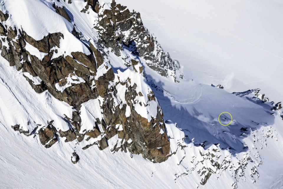 Revealed: The tiny skier is ringed on the right side of the image (Jeremy Barnard/Caters)