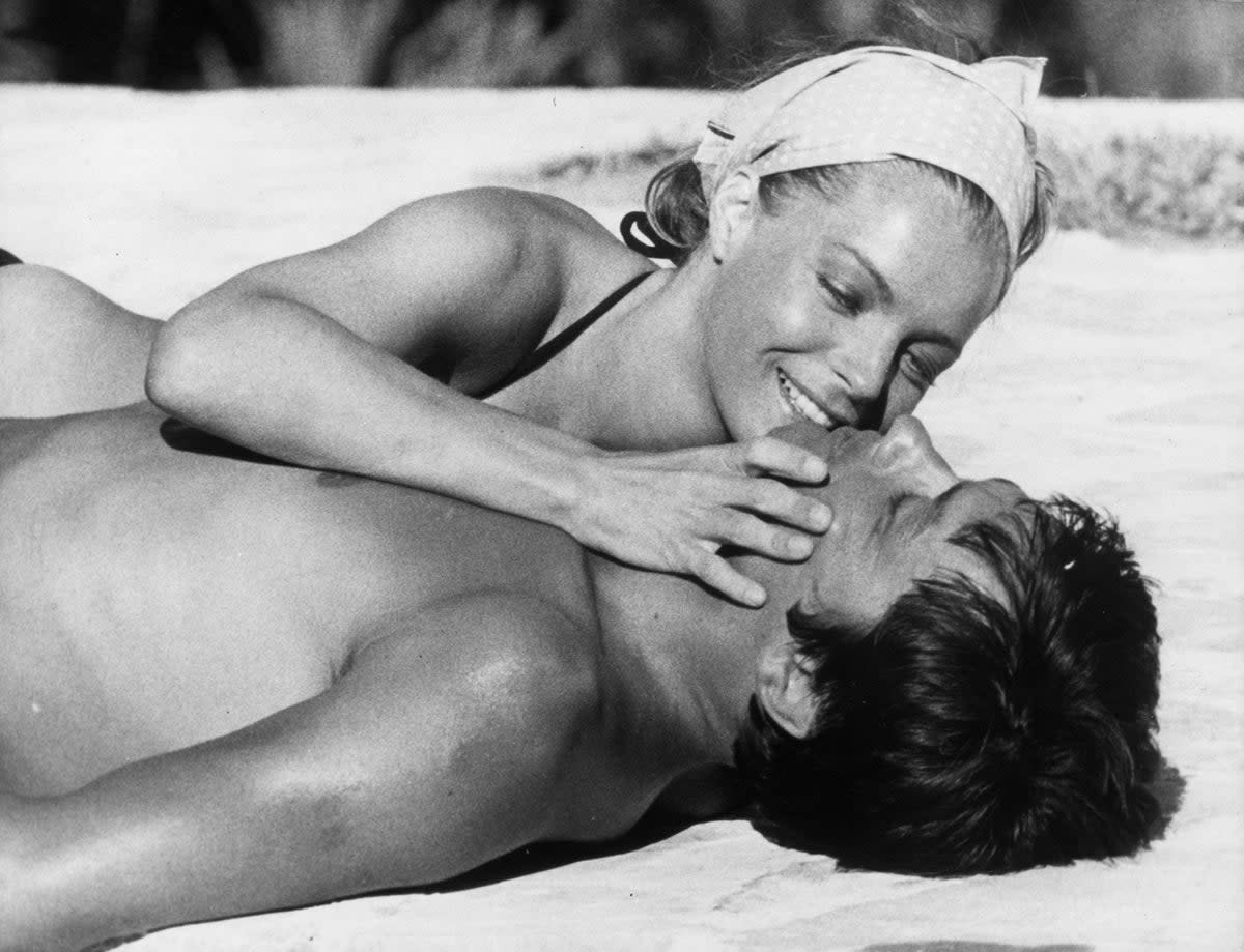 Delon and Romy Schneider in Jacques Deray’s  ‘La Piscine’ (Getty Images)