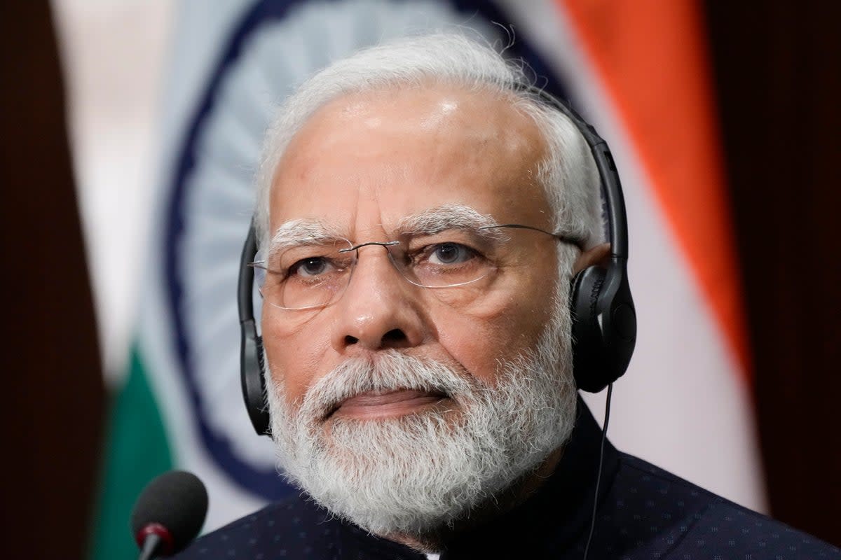 India's Prime Minister Narendra Modi listens as he visits the National Science Foundation in Alexandria (AP)