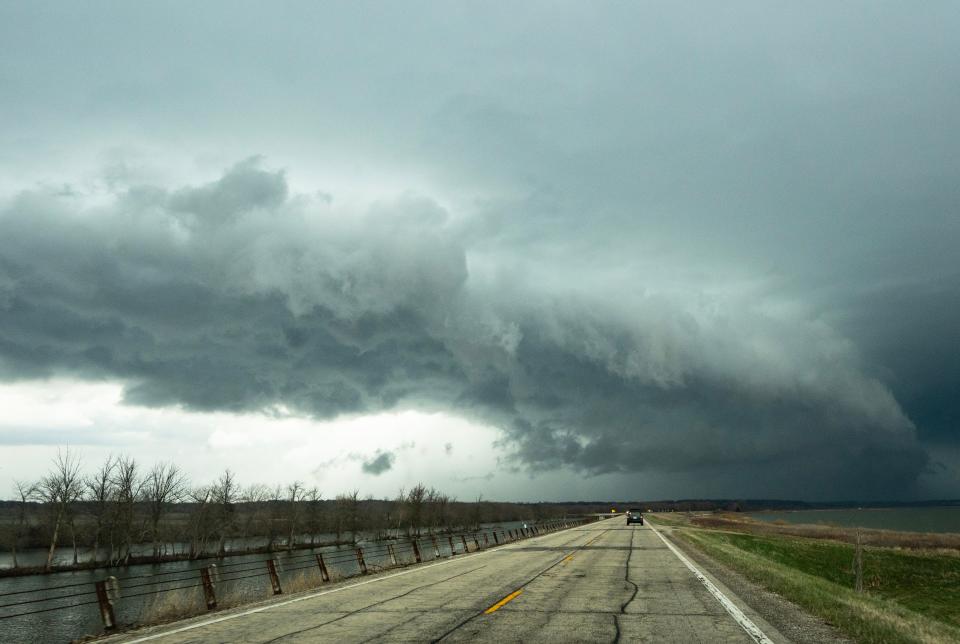 A supercell forms and a wall cloud pushes north of Beardstown, Ill. Friday, March 31, 2023, towards Peoria, Ill. Tornado warnings have been issued in the surrounding counties and spotters have reported a tornado north east of Peoria, Ill.