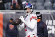 New York Giants quarterback Mike Glennon warms up before an NFL football game against the Chicago Bears Sunday, Jan. 2, 2022, in Chicago. (AP Photo/Nam Y. Huh)