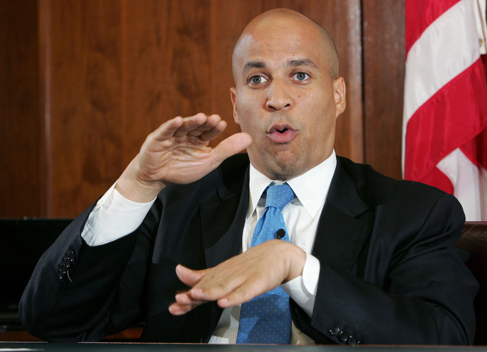 FILE - In this Aug. 20, 2007 file photo, then Newark Mayor Cory Booker, answers a question during an interview in his office in Newark, N.J. Months after Cory Booker took office as mayor of Newark, N.J. in 2006, he enabled his law partner to take power at the nonprofit that supplied water to 500,000 state residents. During the ensuing seven years, allies of the two-term mayor wasted millions of dollars in public money at the Newark Watershed Conservation and Development Corporation. Booker says he was unaware of the corruption, which ultimately destroyed the nonprofit created to protect one of Newark’s most valuable assets. (AP Photo/Mel Evans)