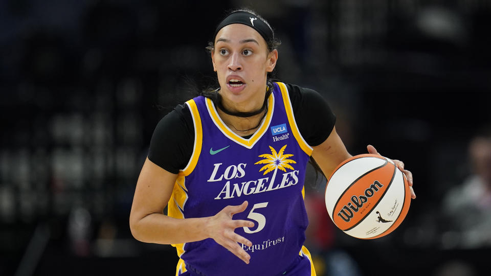 FILE - Los Angeles Sparks forward Dearica Hamby dribbles down the court during the first half of a WNBA basketball against the Minnesota Lynx, game Sunday, June 11, 2023, in Minneapolis. Hamby is replacing Los Angeles Sparks teammate Cameron Brink, who suffered a torn ACL last week, on the U.S. Olympic 3x3 basketball team. (AP Photo/Abbie Parr, File)