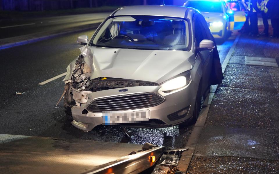 The Ford Focus that police were forced to bring to a hard stop after a 45-mile chase across Surrey and Sussex