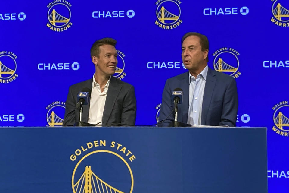 New Golden State Warriors GM Mike Dunleavy Jr., left, and NBA basketball team majority owner Joe Lacob speak during an introductory press conference in San Francisco, Monday, June 19, 2023. (AP Photo/Janie McCauley)
