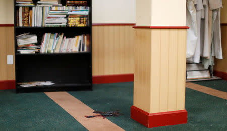 Blood is seen inside the Quebec Islamic Cultural Centre in Quebec City January 31, 2017. REUTERS/Mathieu Belanger