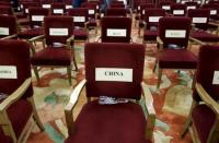 Seats for the delegates from China and other member countries are pictured ahead of a signing ceremony of articles of agreement of the Asian Infrastructure Investment Bank (AIIB), at the Great Hall of the People in Beijing, June 29, 2015. REUTERS/Jason Lee/Files