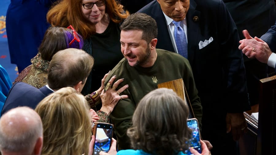 Ukrainian President Volodymyr Zelensky leaves the House Chamber